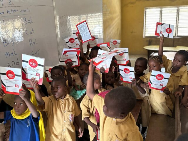 Kids holding books